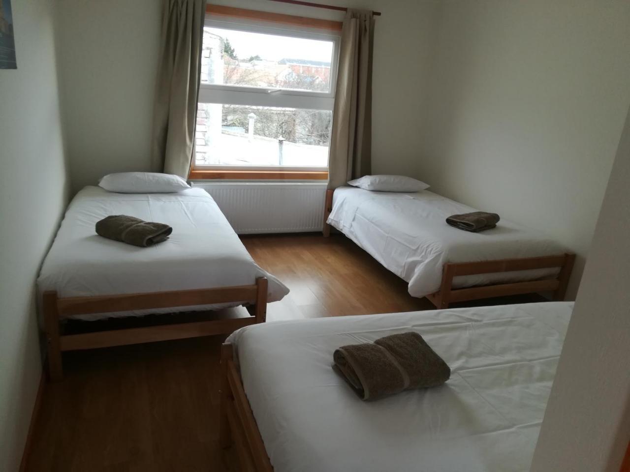 פורטו נטאלס Hostal Camino De Santiago מראה חיצוני תמונה